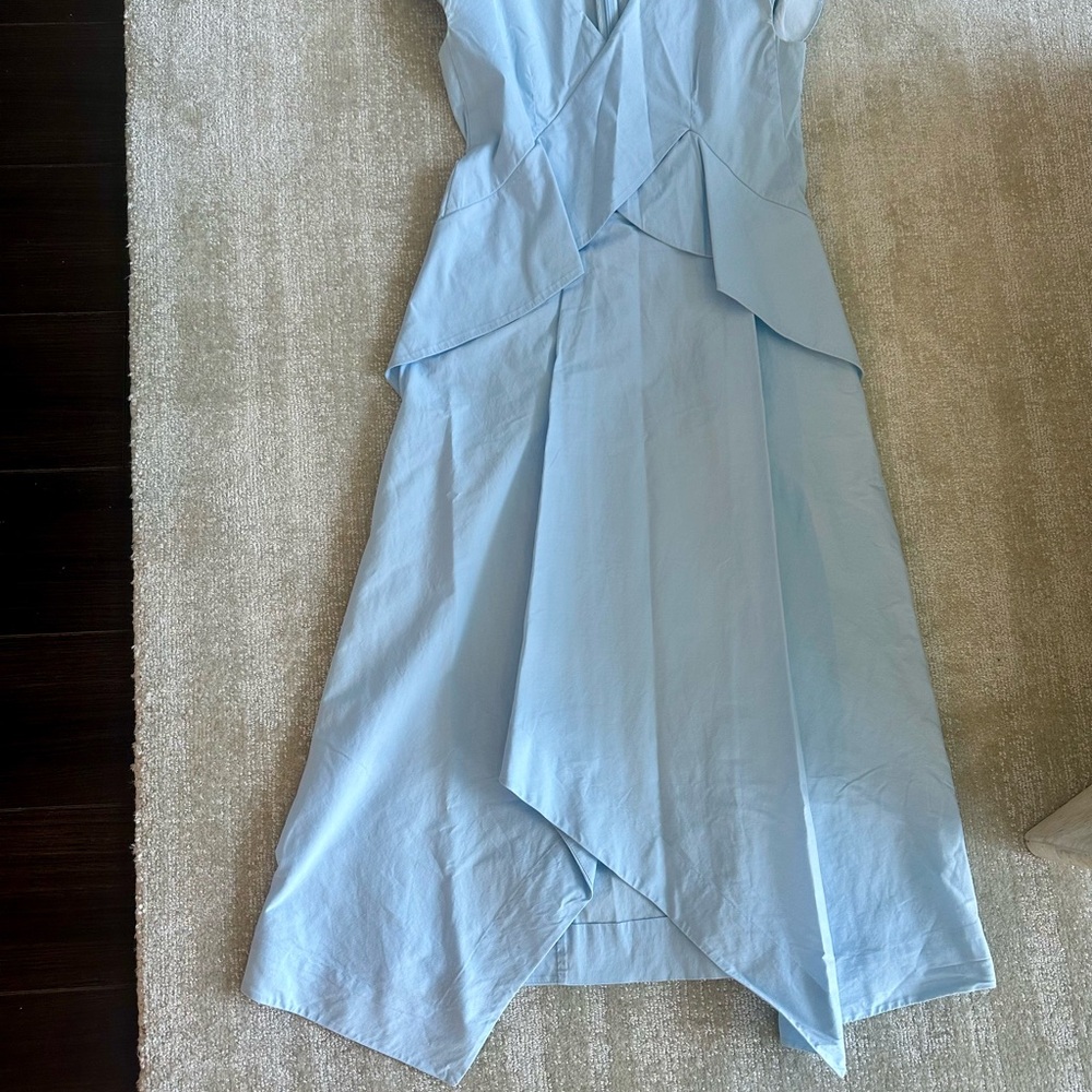 Elegant Light Blue Sleeveless Dress in very good condition
